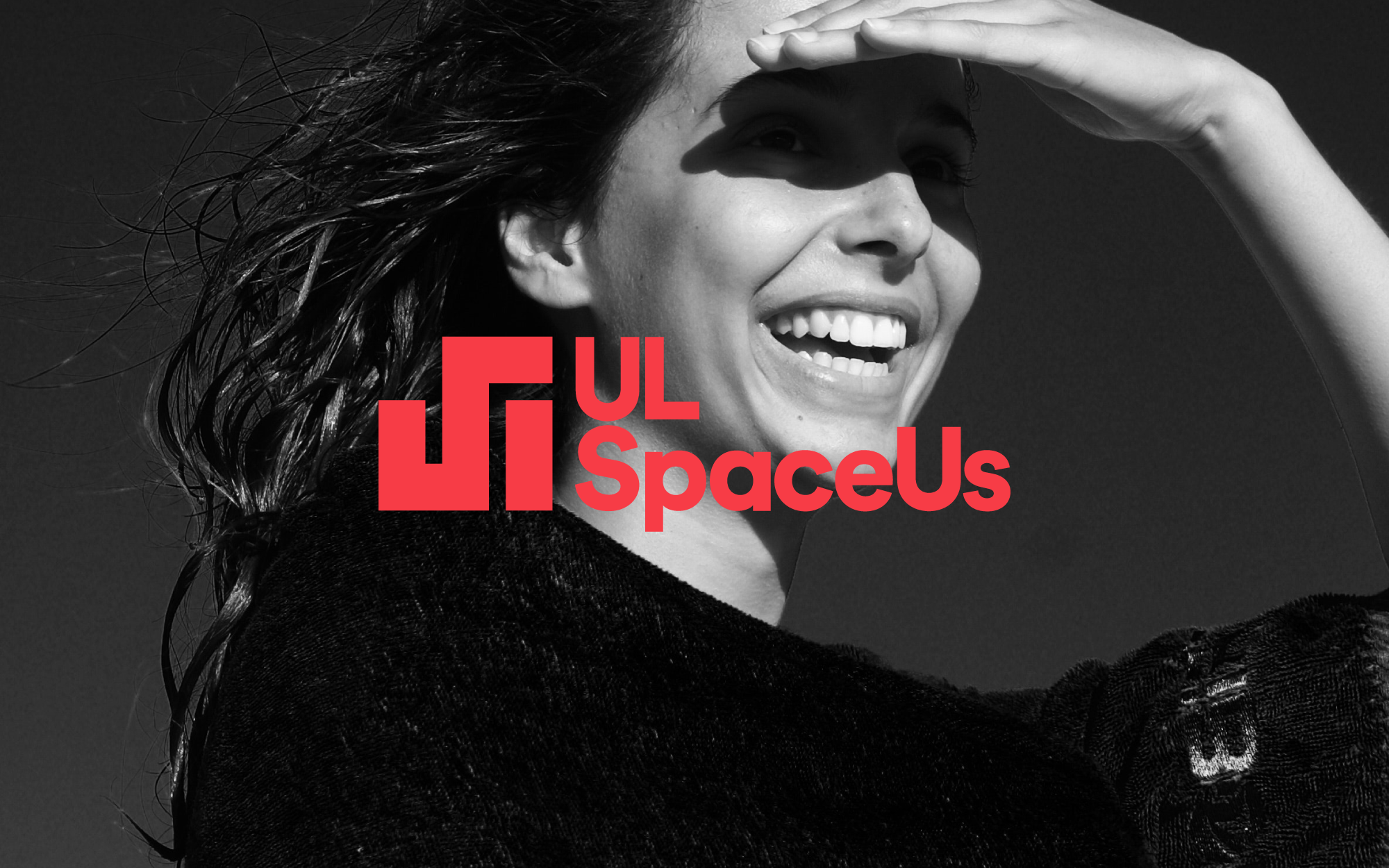 Red UL SpaceUs symbol and wordmark over a black-and-white portrait